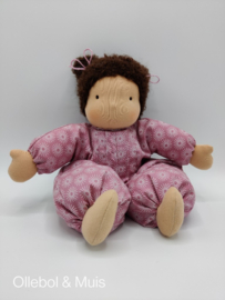 Soft doll pink with brown hair