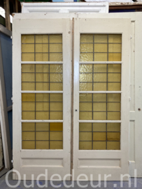 nr. e455 ensuite deuren met geel glas in lood