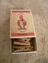 wooden pegs in box