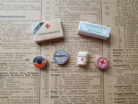 bandage, 2 boxes, ointment, pills and band aid