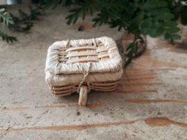 small wicker basket with lid