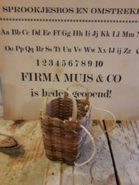 large wicker carrying basket