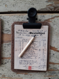 clipboard with order lists