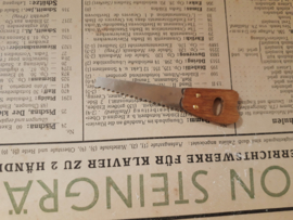 handsaw with wooden handle