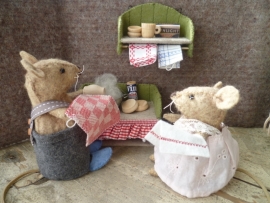 tub with brush, soap and a tea towel