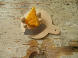 Wooden plate with cheese knife