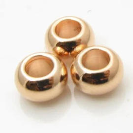 1x DQ metaal kraal ca. 4 x 6mm, gat ca. 3mm rose goud kleur (Nikkelvrij)