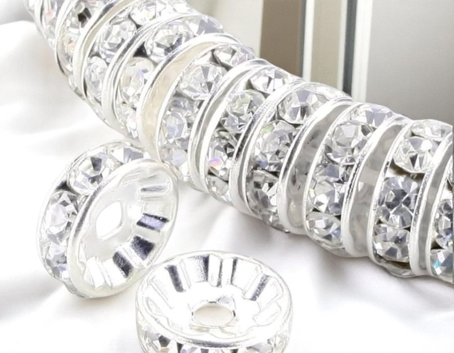 50 x Verzilverde kristal rondellen – ca. 10 mm – kleur blank – gat ca. 1 mm