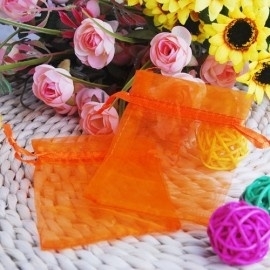 c.a. 100 organza zakjes 10 x12 cm oranje