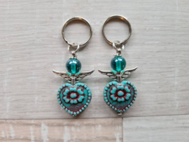 2 x Tsjechische Glaskralen Heart Beads Roos 17x17mm turquoise