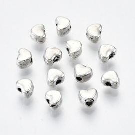 10 x verzilverde hart kralen 3  x 4 x 3mm gat: 1,2mm