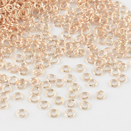 C.a. 100 x  rose gold ringetjes 4mm 0,7mm dik