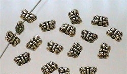 15 x metallook vlinder goudkleur 4 x 6mm