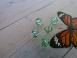 10x Preciosa Kristal Bicone pistache groen ca. 6mm  gat: 1mm