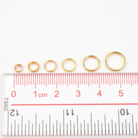 1 doosje met gemengde goudkleur split ringetjes Ø  4~10mm  dik 1,4mm (Nikkelvrij)