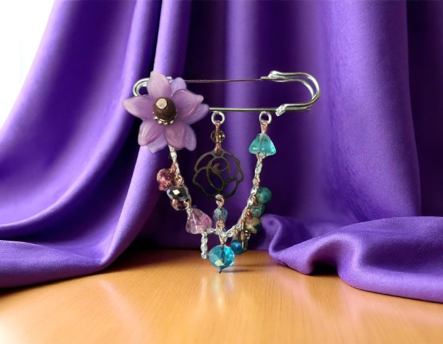 Broche spelden