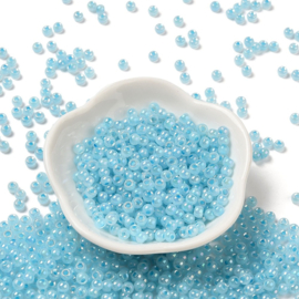 20 gram Glaskralen rocailles Ceylon 4 x 3 mm – gat 1,2 mm – Sky Blue