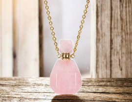 Gedenk hanger mini urn van edelsteen Rose Quartz (ook de dop) met goudkleur RVS ketting