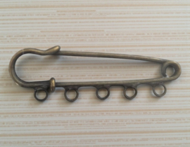 Metalen kiltspeld 50mm x 17mm, oogjes 3mm geel koper kleur