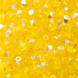 10 x  Tsjechische kralen facet kristal 6 x 5mm kleur: ab geel Afm: Gat c.a: 1mm