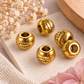 10 x Metalen kralen rond 7 mm – gat 3 mm – antiek goudkleur (Nikkelvrij)