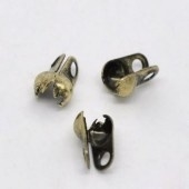 10 x gesloten kalotjes 4 x 6mm oogje 1mm zijwaarts geel koper kleur Ø 2,4mm  Nikkelvrij