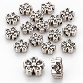 10 x Metalen bloem kralen 3D 7 x 3,5 mm – gat 1 mm – antiek zilverkleur 