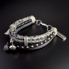 Prachtige armband, verstelbaar met metalen elementen w.o. bedel dream