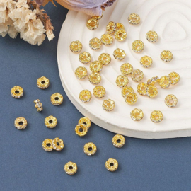 50 x Vergulde kristal rondellen 6 x 3 mm – gat 1 mm – clear