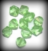 10 x Glaskraal facet konisch lime groen 8 mm
