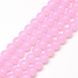 Mooie streng met c.a. 125  ronde glaskralen 6mm gat 1,3mm opalite pink