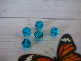 10 x Preciosa Kristal Bicone 6mm  gat: 1mm Kleur hemels blauw