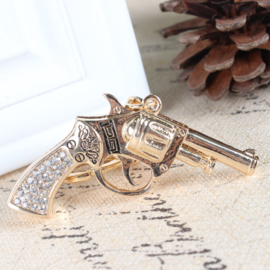 Prachtige sleutelhanger met kristal strass in de vorm van een pistool revolver. Lengte 5cm x 4 cm