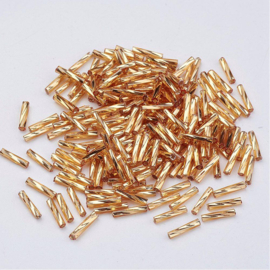 10 gram Glaskralen Rocailles Special Buggles Twisted 12x2mm, gat: 0,5mm Metalic Gold