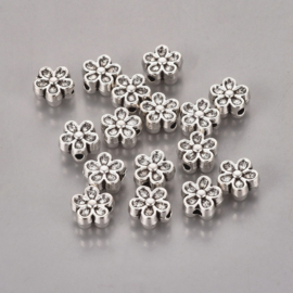 10 x Metalen bloem kralen 3D 7 x 3,5 mm – gat 1 mm – antiek zilverkleur 