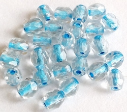 20 stuks  Glaskraal facet blauw 4 mm lichtblauwe binnenkern