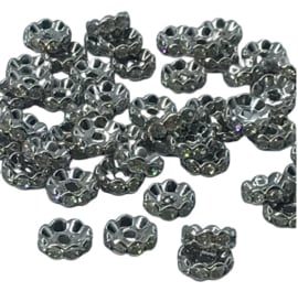 50 x Rondellen  platinum kleur 6 x 3 mm  gat: 1,5mm clear