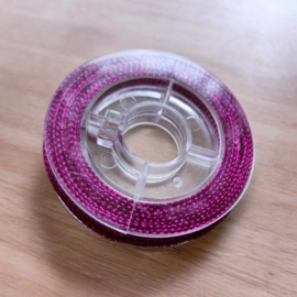 1 rolletje gevlochten metallic koord fuchsia 0,8mm, c.a. 9m per rol