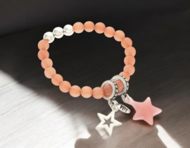 Natuurstenen kralen Biba Armband roze met ster silver plated bedels met elastiek