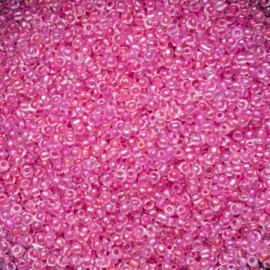 Per 20 gram Rocailles 12/0  roze transparant Luminous inside
