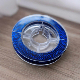 1 rolletje gevlochten metallic koord blauw 0,8mm, c.a. 9m per rol