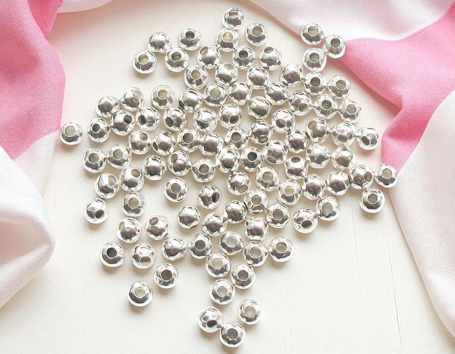 100 x Metalen kraaltjes zilverkleur 4 mm – gat ca. 1 mm