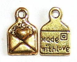 10 x Bedeltje "Made with love" goud kleur 10 x 6,5mm ♥