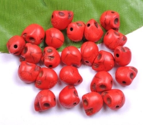 10 keraniek Howlite skulls rood c.a. 10mm Gat: 1mm