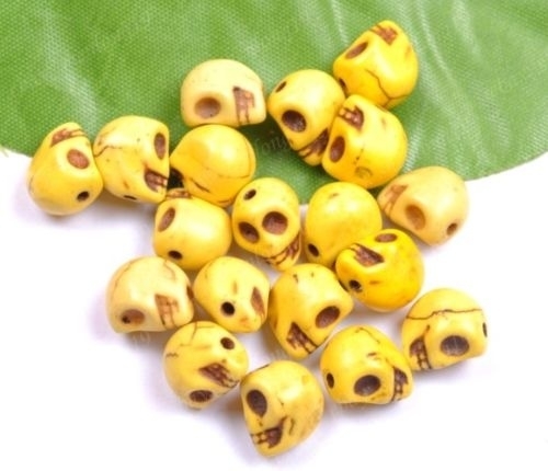 10 keramiek Howlite skulls geel  c.a. 10mm Gat: 1mm