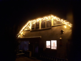 Ons eigen huis in de ijspegel kerstverlichting