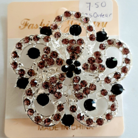 Grote zilverkleurige broche met paarse strass 6,2 cm