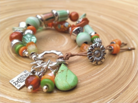 Workshop armband met knoopsluiting €35,-