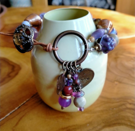 Dubbele bronskleurige armband met paarse en bruine tinten