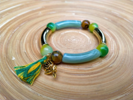 Groen en turquoise tube armband met glasparels